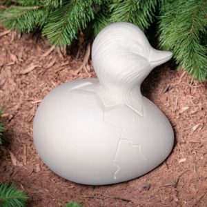 Egg with duckling peaking out