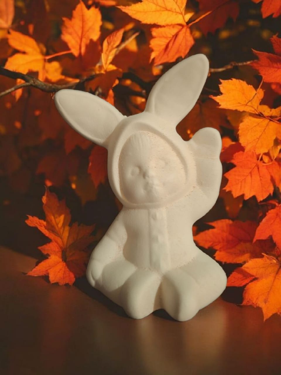 Baby in bunny onesie